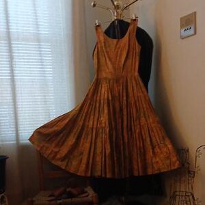 Elegant High-Low Dress in Gold by [Brand]